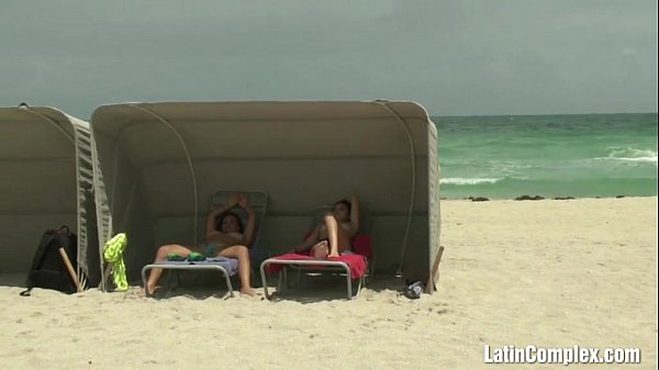thumb topless latina sunbathing