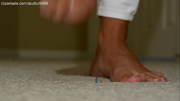 Giant Sexy Woman Squeezing and Crusing Small Toys With Feet