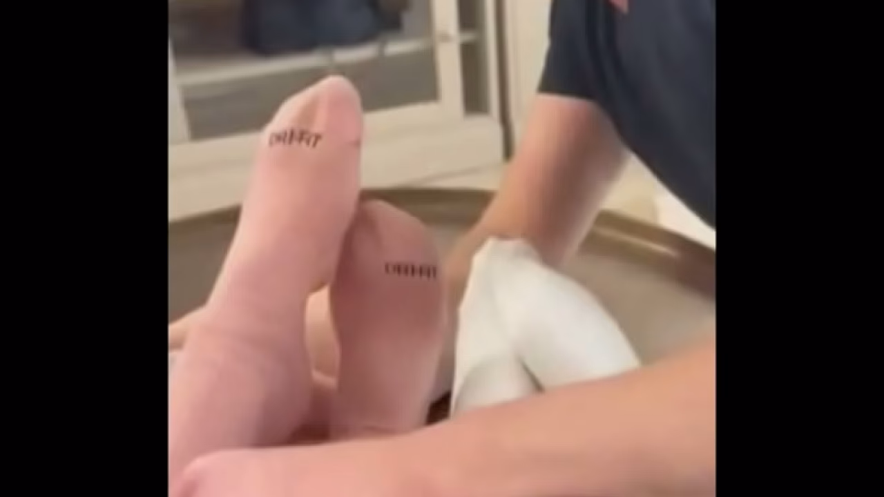 Kirstin, Luna, and Giggi are having fun with their foot slave.