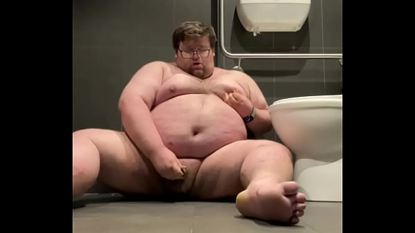 Download Video - Chubby plays in public bathroom
