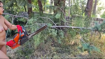 GASOLINE CHAINSW NAKED GIRL CUTTING BRANCHES