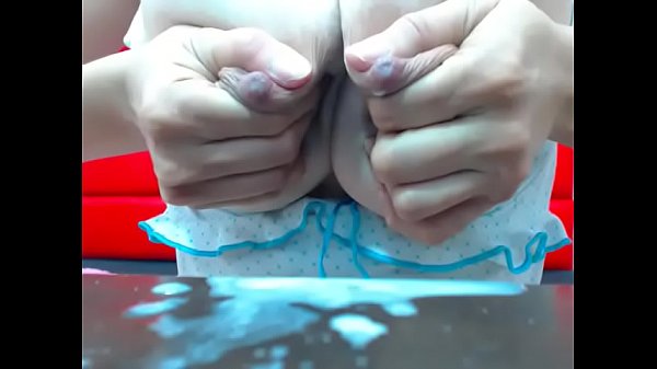 Milf making her big boobs squirt with milk