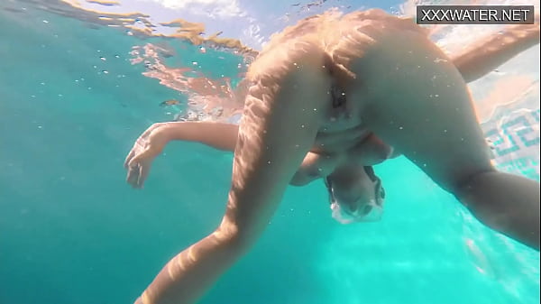 Amelie Bruna tasty brunette with big tits in the pool