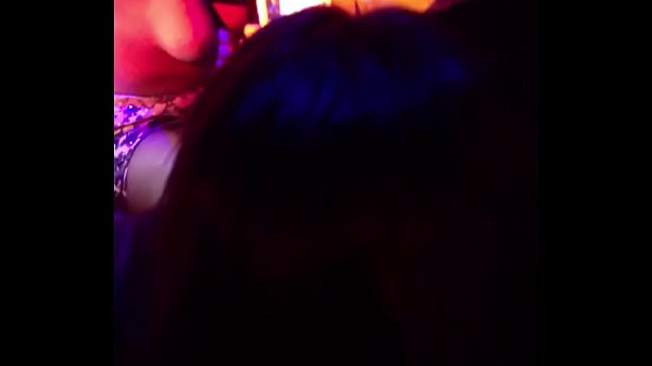Girl sits on Ciroc bottle while eating girl out on stage