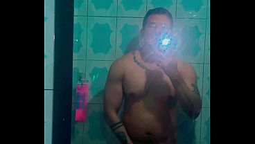 Muscular married man masturbates his cock in the shower