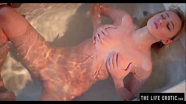 Little blonde girl fingers her ass and pussy in the tub