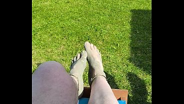 Barefoot waiting for the tide to come in on the beach