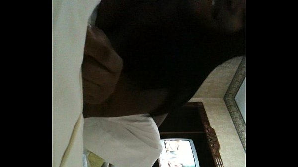 Black couple getting it in a hotel.