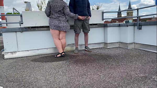 Gorgeous pissing fat MILF helps me piss on top of the parking lot