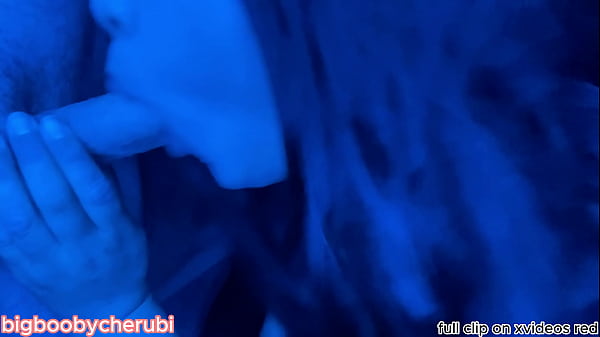 Big booby Asian teen suck and strokes cock under rave lights