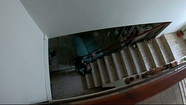 Brunette MILF with tattoos performs oral sex on a well-endowed man.