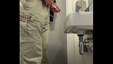 Pissing in a sink in public toilet