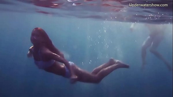Naked girls on Tenerife having fun in the water