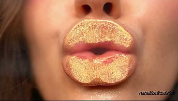 Extremely Shiny Metallic Golden kiss Close up