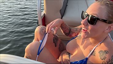 Lola Maverick big tit slut pisses off boat public
