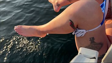 Lola Maverick big tit slut pisses off boat public