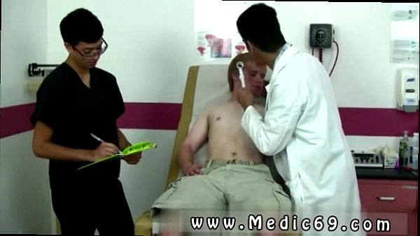 Leaning over the bed the doctor got behind me g...