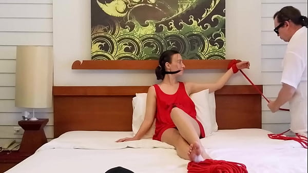 Sofi Bondage red ropes on the bed