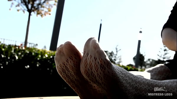 Sexy Feet In White Fishnet Pantyhose Outdoor