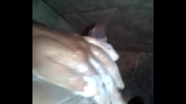 brunette jacking off in the bath