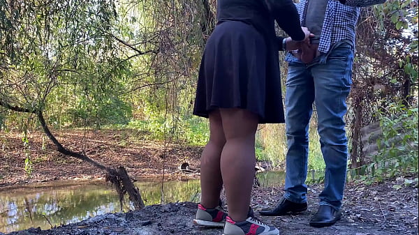 MILF holding my dick while masturbating outside