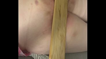 Spanked with a Big, Heavy Paddle