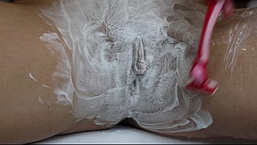 Extreme closeup of hairy tight pussy shaving!