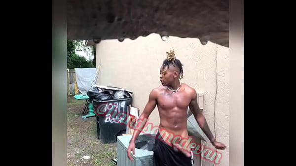 Download Video - Neighbors Watch young man jerk his dick in the rain &lpar;Handsomedevan&rpar;