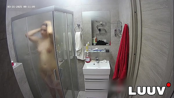 LUUV. A brunette showers, used to amateur cameras, showing her natural body