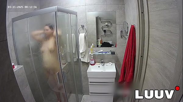 LUUV. A brunette showers, used to amateur camer...