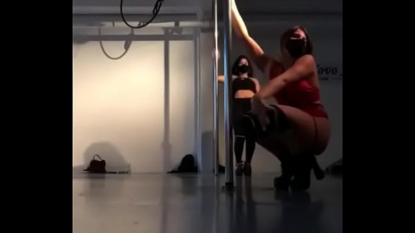 Sexy doctor strips naked while dancing on the pole