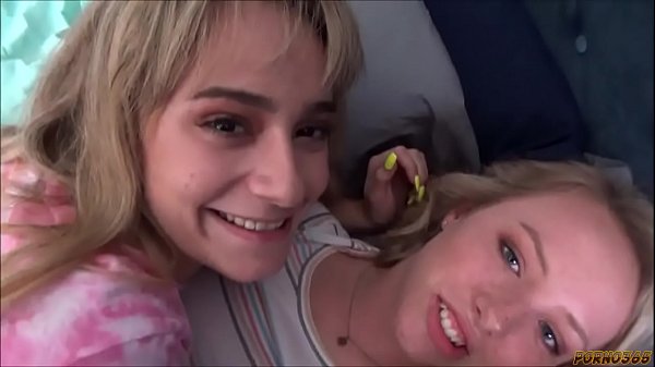 Two girls and a in have group sex in the b...