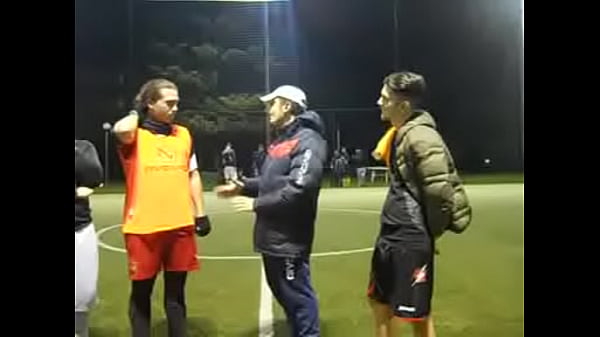Hot sweaty football player grabbing cock while ...