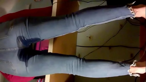 Emma pissing and working in tight jeans