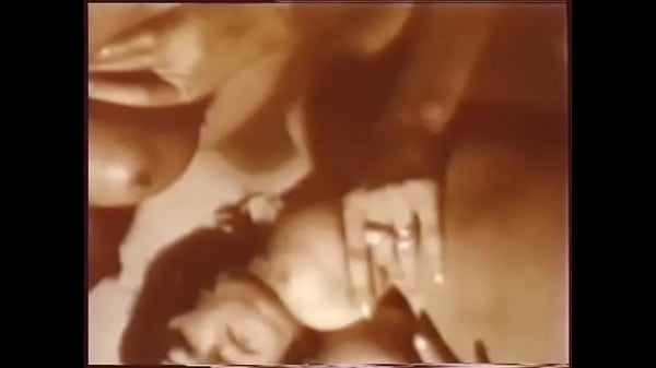 Three horny girlfriends suck big tits and caress each other on cam for a 60s porn movie
