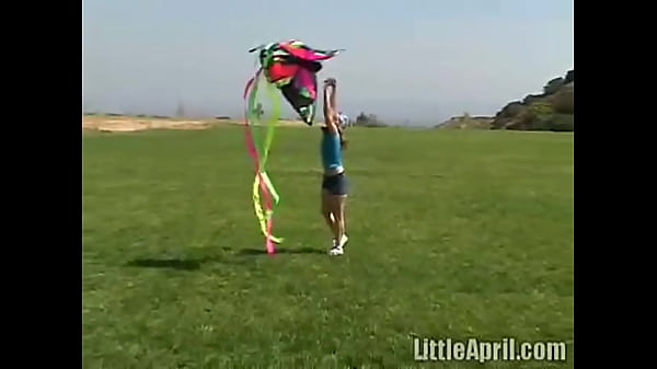 Teen rubbing her clit outdoors and sucking a popscile - Little April