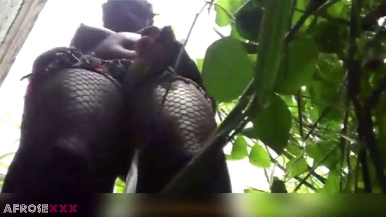 Cute ebony fucking her pussy outdoor