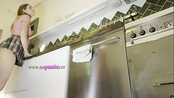 Super hot beautiful new wife takes her g-string dental floss thong off under her mini college skirt in the kitchen to flash pussy and ass