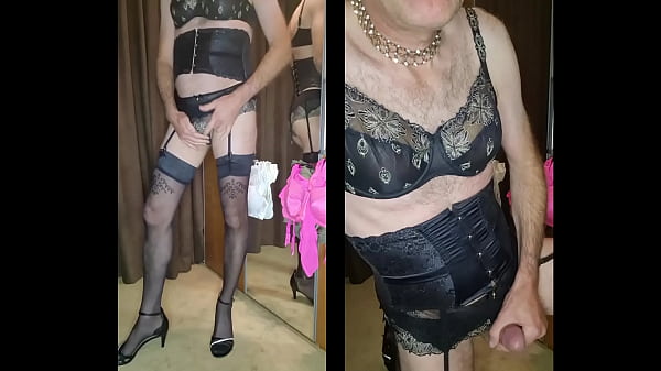 Crossdresser wearing black corset