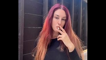 Artemisia Love long hair fetish smoking a cigarette outdoor