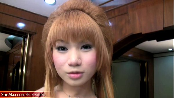 Video of Feminine ladyboy teasing and tugg...