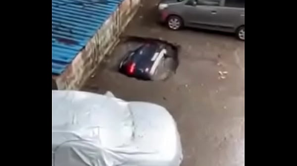 Car sinks into mud (Meme)