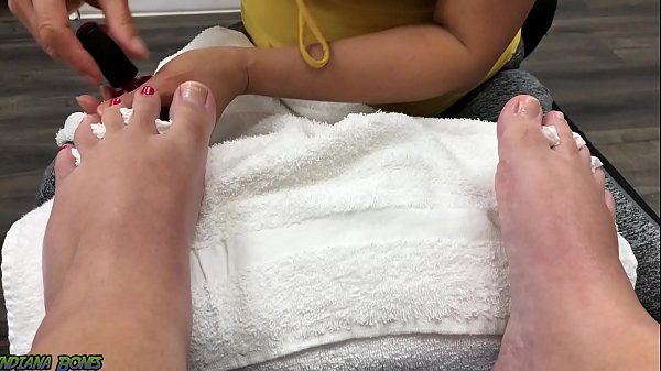 Chubby Slut gets a pedicure and gives a footjob