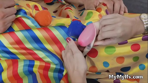 Horny housewife rides clowns hard cock