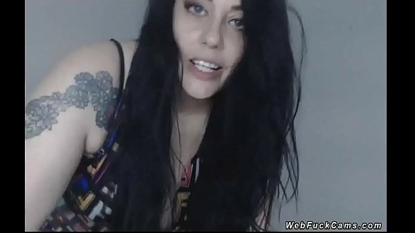Brunette flashes huge tits on cam