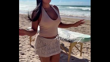 Kriss, a hot wife slut, wearing a completely transparent bikini to give a massage on the beach, the masseur got very horny.