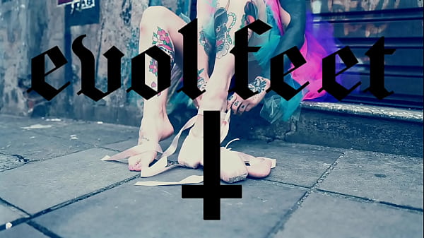 Ballerina Wearing Ballet Shoes and Walking Down The Street