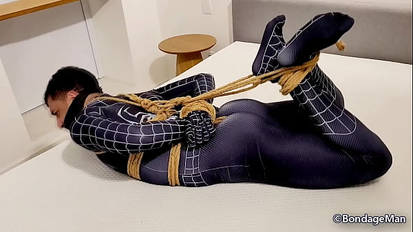 Pedro Zayan tied up and gagged in spiderman suit