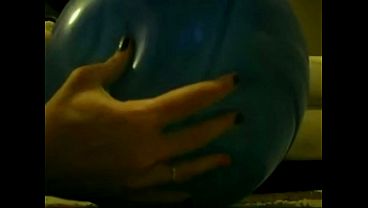 Sophie masturbating with baloons in living room and bathroom
