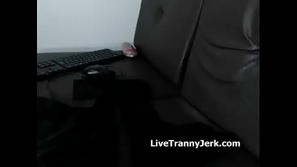 Latina tranny shoots a big load all over herself